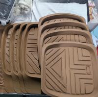12 Car Floor Mats. Unknown Make and Model. Largest 28.5" Long.