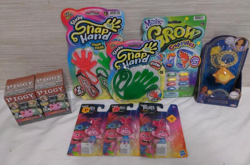 Assorted Toys, Trolls World Tour, Piggy Light Up Clips, Snap Hands, and Magic Grow Capsules