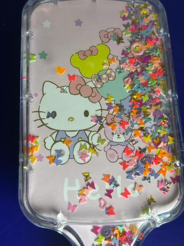 Sanrio Hello Kitty Filled with Glitter Sparkles Inside Cushion Hair Brush - Kitty Face Design, Soft Rubber Teeth, ABS Anti-Slip Handle, Wide-Toothed Floating Sand Sequins Approximately 8 inch