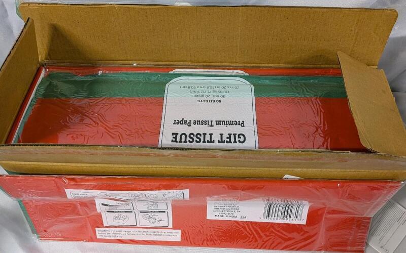 24 New Packs of Tissue Paper. 20" by 20" and 20 Green and 30 Red sheets per pack.