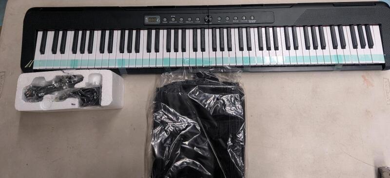 As New Electric Keyboard. 42.5" Wide.