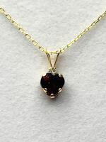 10KT Yellow Gold Natural Garnet Heart Shape Pendant with Gold Plated Sterling Silver Chain, Retail $350.00. Garnet is the birthstone for January.