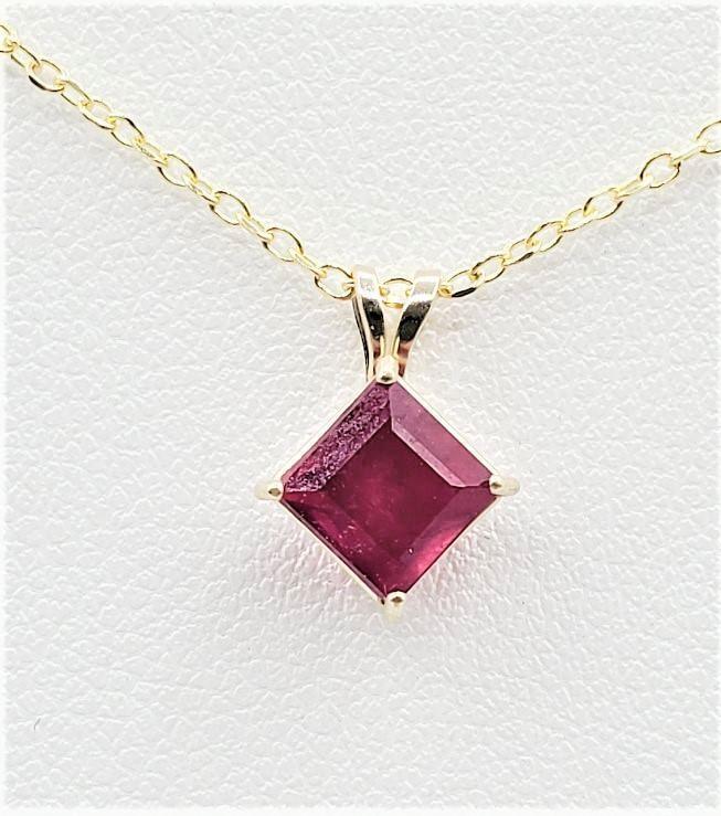 10KT Yellow Gold Natural Ruby (1.65ct) Pendant with Gold Plated Sterling Silver Chain, W/A $720.00. Ruby is the birthstone for July.