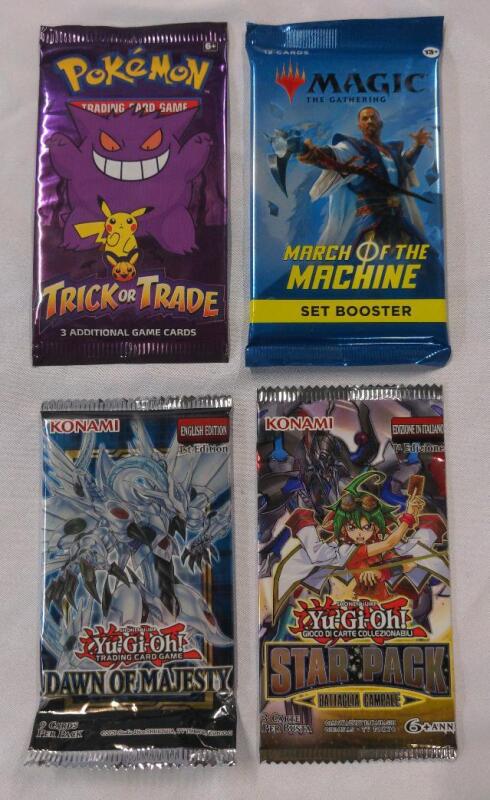 4 New Packs of Trading Cards, Pokemon, Yu-Gi-Oh, and Magic the Gathering
