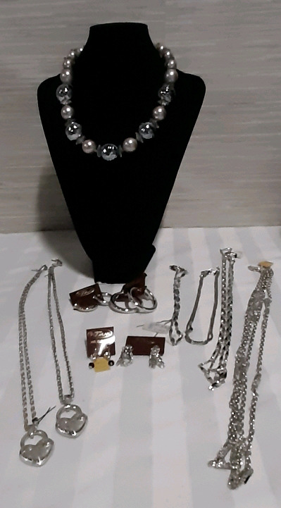 New Vintage D'Orlan Jewellery .A mixed lot with earrings, chains and a necklace.