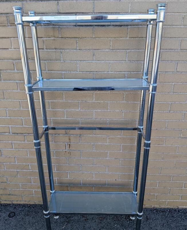 3 Tier Bathroom Shelf with Built In Towel Rack. Approximately 59" Tall. Has lean. See photos