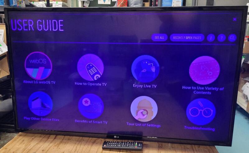 As Is - LG UHD 4K 43" Smart LED Television w/Remote . Tested Working . Blue Tint on screen (can't find menu to adjust brightness) . No stand must hang on wall