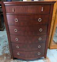 Somberton Tall Boy Dresser. Minor scuff present from use. Measure 56" Tall, 40" Wide and 20" Deep.