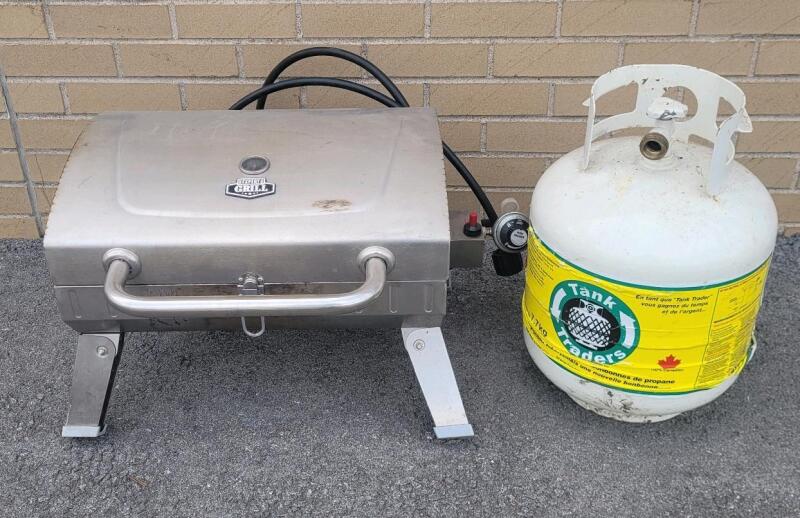 Expert Grill Portable Propane BBQ w/Propane Tank . Would benefit from cleaning before use .