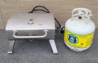 Expert Grill Portable Propane BBQ w/Propane Tank . Would benefit from cleaning before use .