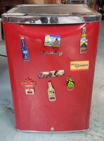Danby Red Mini-Fridge w/Bottle Opener Magnets . Flat top to rest drinks and snacks . Measures 17.5"&times;27"&times;19" . Tested Working . Would benefit from cleaning before use
