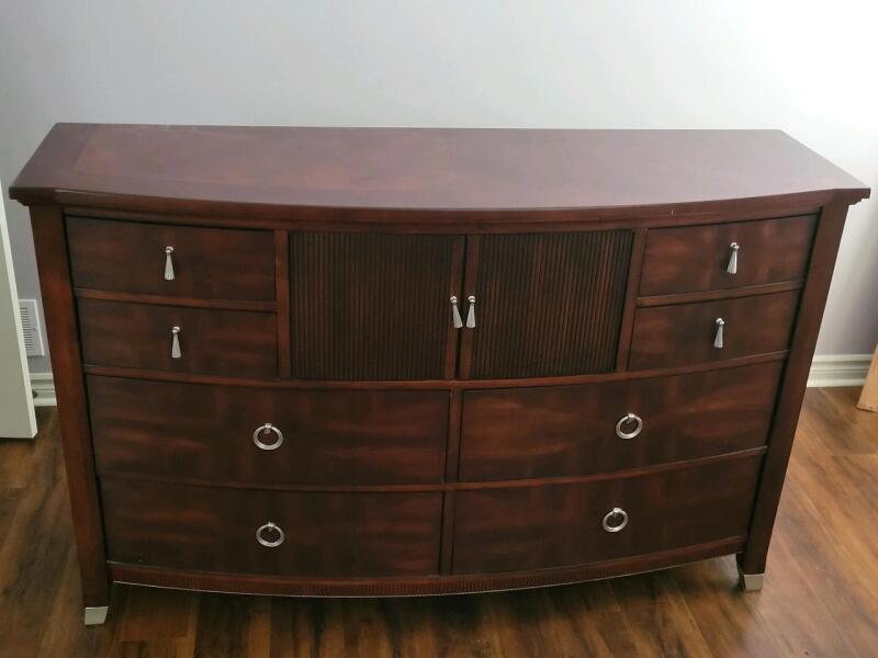 Wood 8-Drawer Bow-Front Dresser . Measures 65"&times;41"&times;20 &frac34;" . Great Condition , some minor scuff wear