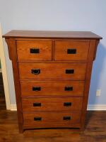 Wood 6-Drawer Tall Boy Dresser . Measures 42"&times;54.5"&times;18 . Great Condition , some minor scuff wear . Missing three (3) handles
