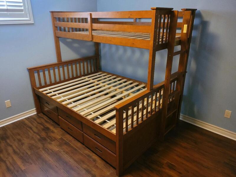 Wood Twin over Queen Bunk Bed w/Bottom Drawers . Measures 84"&times;65" (bottom) & 80"&times;39" (top) . Some Assembly Required