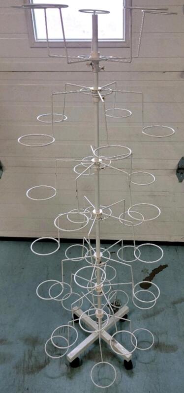 As New 7-Tier Display Rack on Wheels , measures 63" tall