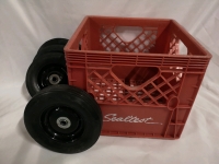 4x Tires (7.5" diameter) and a Milk Crate Sealtest