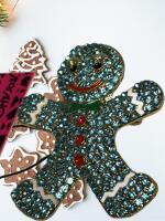Gingerbread Man Brooch / Pendant Blue Rhinestones Betsey Johnson Icing, Bow and Eyebrows Glow Tagged appropriately 2 x 1.75&rsquo;&rsquo;