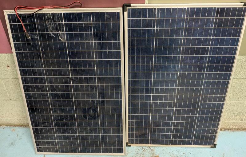 [Minor Damage]2 As New Coleman 100 Watt, 12V Crystalline Solar Panel Retails $650.