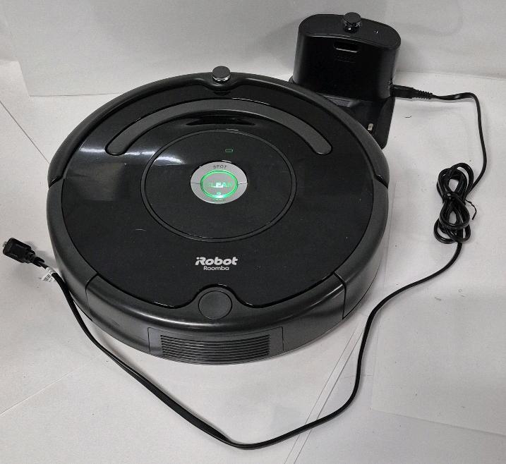 IRobot Roomba Electronic Vacuum- Working