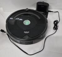 IRobot Roomba Electronic Vacuum- Working