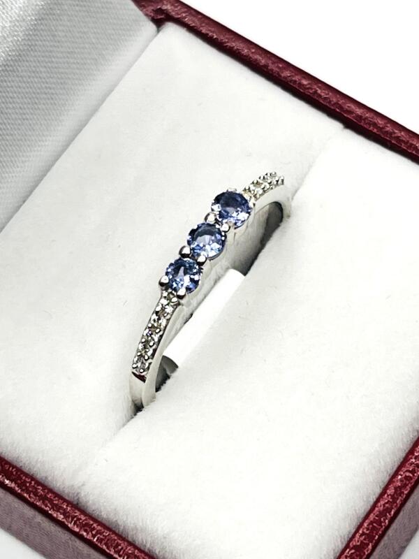 Sterling Silver Natural Tanzanite (0.33ct) with CZ (0.10ct) Ring, Size 8, W/A $270.00. Tanzanite is the birthstone for December. with appraisal