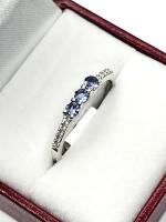 Sterling Silver Natural Tanzanite (0.33ct) with CZ (0.10ct) Ring, Size 8, W/A $270.00. Tanzanite is the birthstone for December. with appraisal