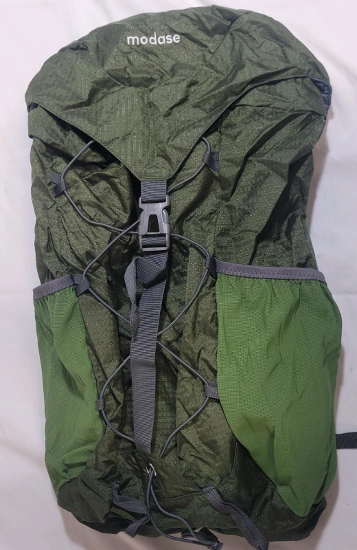Modase Hiking Backpack , 40L Lightweight Water Resistant Travel Backpack w/Hip Belt for Outdoor Climbing Camping Hiking Travel . Appears Unused .