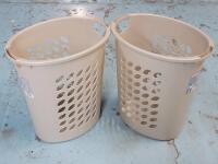 Two (2) Sterilite Laundry Baskets . Measures 22" Tall