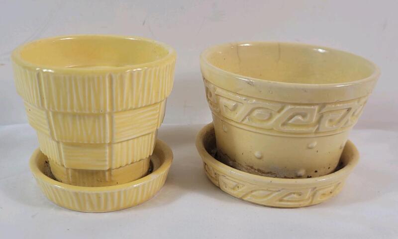 Two (2) Vintage McCoy Small Yellow Basket Weave & Axtec Flower Planters . Small crack on one planter