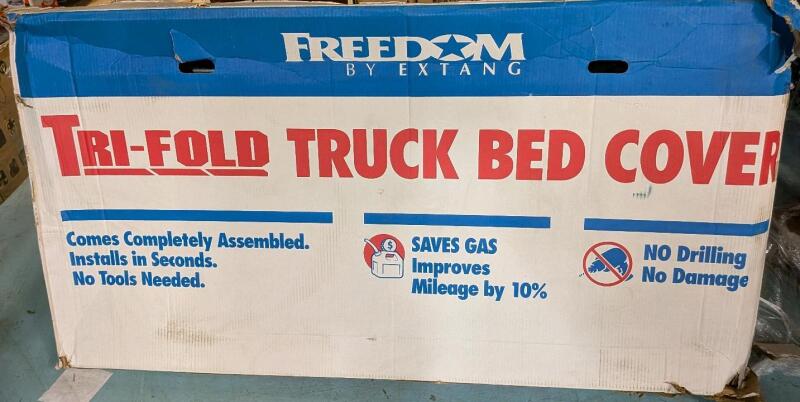 As New Freedom by Extang Trifold Truck Bed Cover. Similar products retail for 449.00. See Photos For Model.