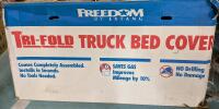 As New Freedom by Extang Trifold Truck Bed Cover. Similar products retail for 449.00. See Photos For Model.