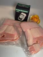 New 2pcs Universal Thumb Brace in Pink - Supports Left or Right Hand, Fits Men and Women / New Pulse Oximeter Stock photos of Brace