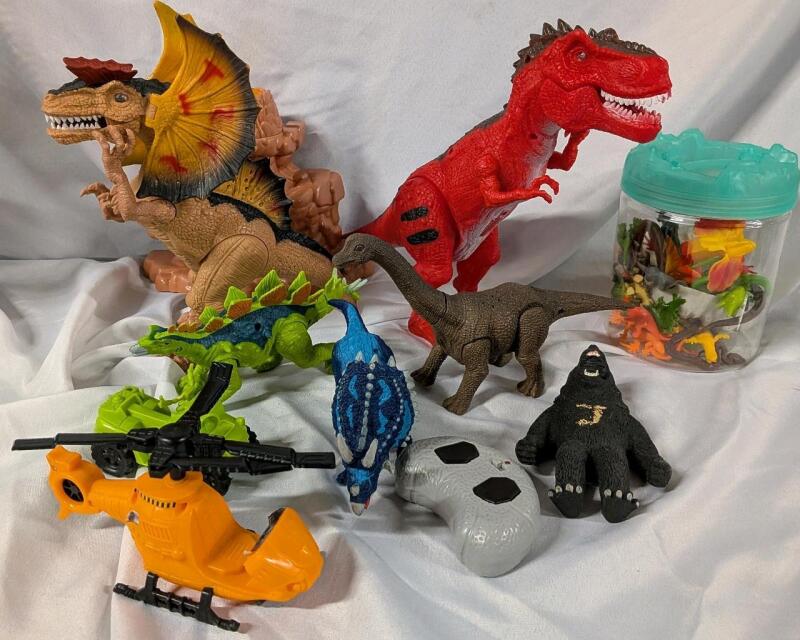 15+ Assorted Children's toys, Primarily Dinosaur Themed. Tallest Stands 10.5"