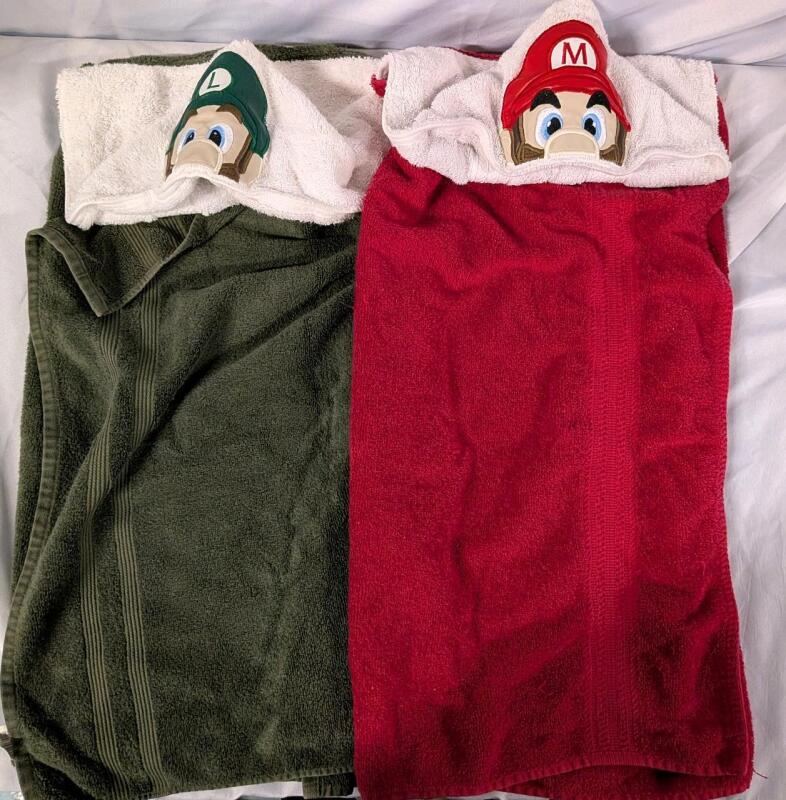2 Towels with Hoods - Mario Themed. 52" by 30" without the hood.