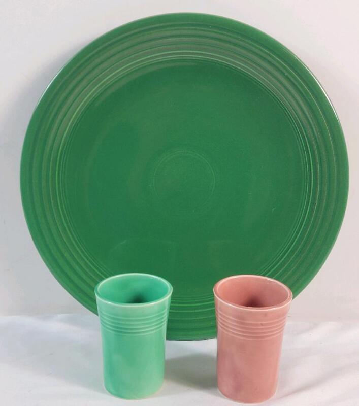 Fiestaware Green Plater & Two (2) Cups . No chips or cracks to plater . Both cups have chip on bottom edge . Plater measures 12" diameter