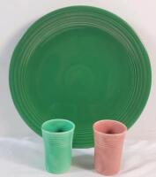 Fiestaware Green Plater & Two (2) Cups . No chips or cracks to plater . Both cups have chip on bottom edge . Plater measures 12" diameter