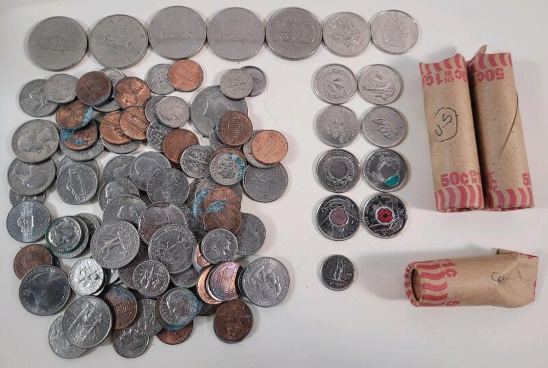 Canadian & USA Coin Lot . Canadian One Dollar Coins , Quarters and Pennies . USA Half Dollar Coins , Quarters , Dimes , Nickels and Pennies .
