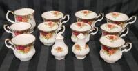 Royal Albert " Old Country Roses " Tea & Coffee Cups plus Salt and Pepper Shakers . 3 Coffee Cups , 6 Tea Cups , Creamer & Salt and Pepper Shakers