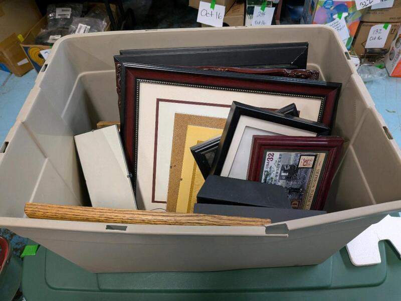 15+ Picture Frames of Various Sizes in Plastic Bin. Bin Measures 22.5" by 18" by 14"