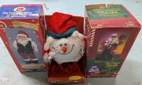 3 Christmas Decorations. Hips Swinging Santa, Sax Playing Santa & Fiberoptic Animated Snowball. All are Approximately 15" Tall.