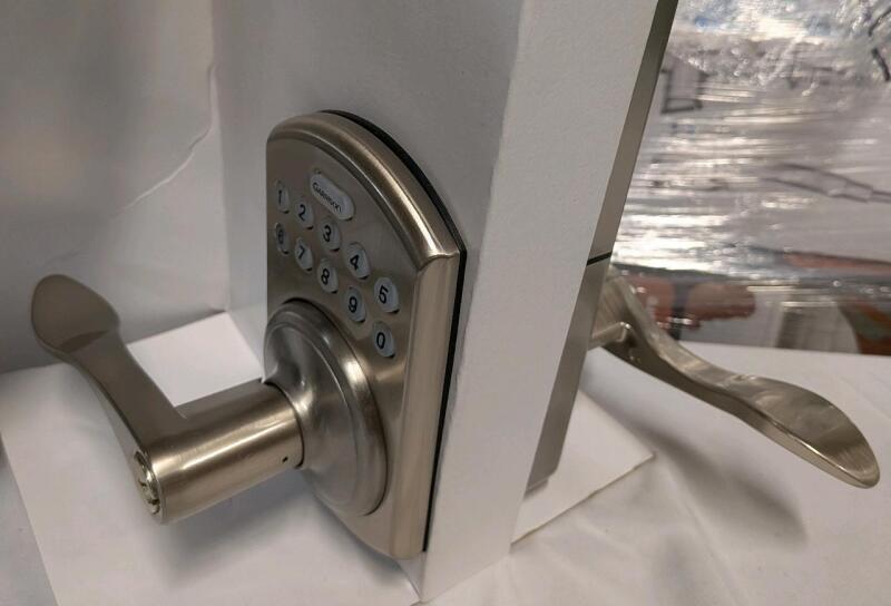 Garrison Electronic Keypad Door Lock with Juran Lever, Satin Nickel. In New condition retails for $165