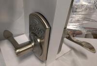 Garrison Electronic Keypad Door Lock with Juran Lever, Satin Nickel. In New condition retails for $165