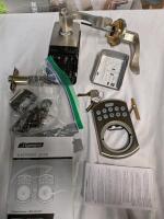 Garrison Electronic Keypad Door Lock with Juran Lever, Satin Nickel. In New condition retails for $165