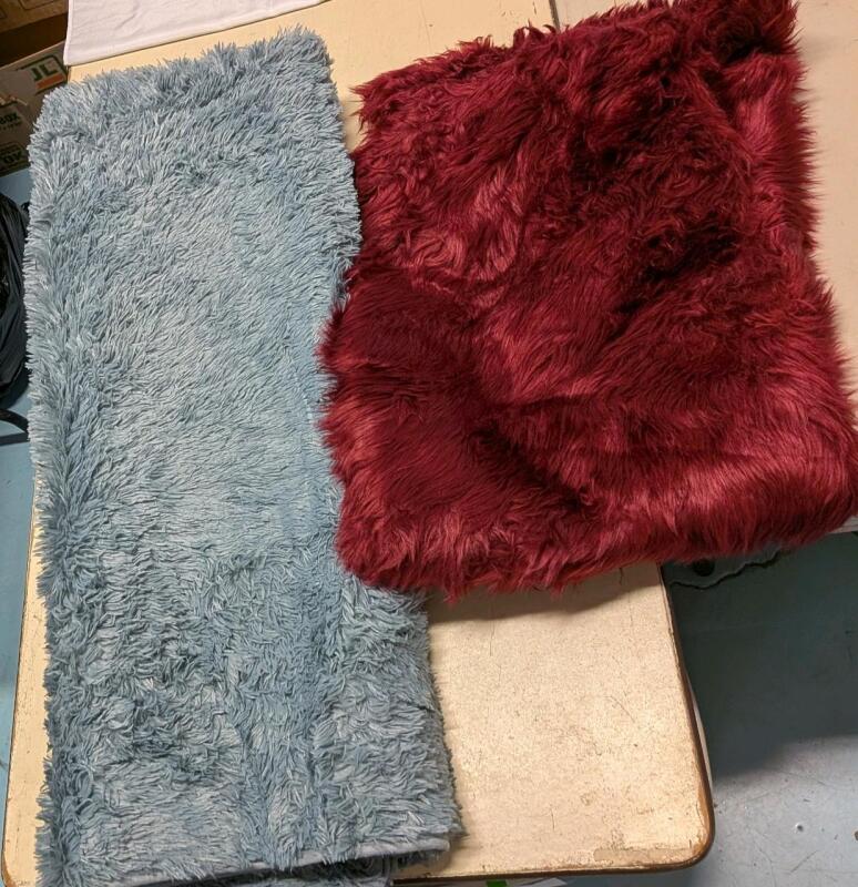 2 Large Shaggy Rugs. Blue (80" by 120") Red (40" by 56)