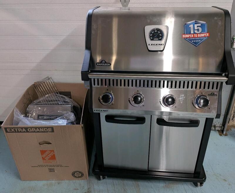[see Description] As New Napoleon Legend LD4 Stainless Steel 4-Burner Natural Gas BBQ Grill with Folding Side Shelves. Retails for $1100. Complete.