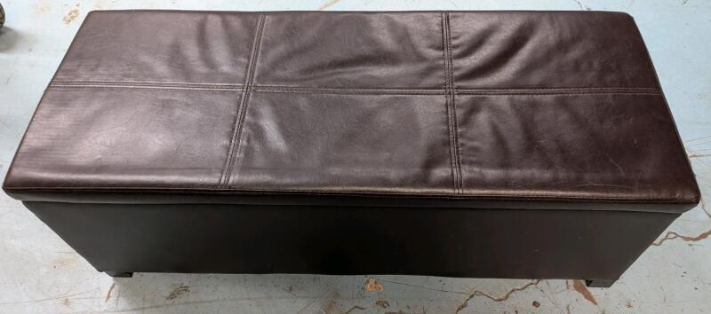 Leather Like Storage Ottoman. Measures 44.5" by 16.5" by 17.5"