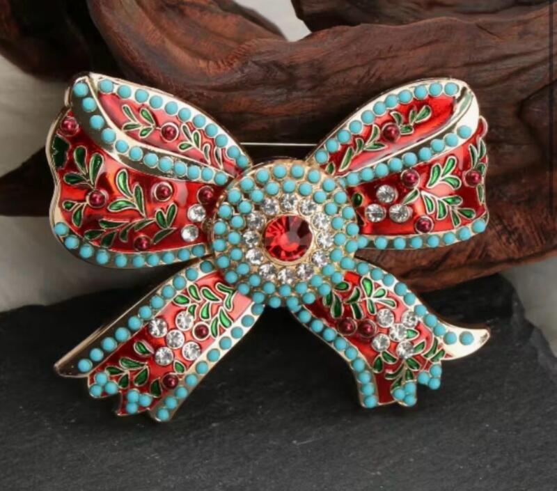 Elegant Vintage Inspired Red Bow Brooch, Rhinestone and Enamel Approximately 3 x 2.45&rsquo;&rsquo; stock photos added