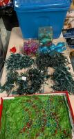 Assorted Christmas Decorations with Bin. Bin Measures 14" wide, 13" Tall, and 19.5" Long. 7 Strands of Lights all Tested Working