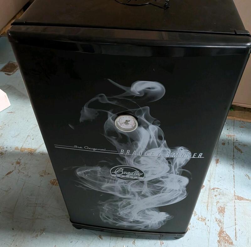 Bradley Smoker BS611 4-Rack Outdoor Electric Smoker, Vertical Smoker With Stainless Steel Grill in Original Condition Retails for $469