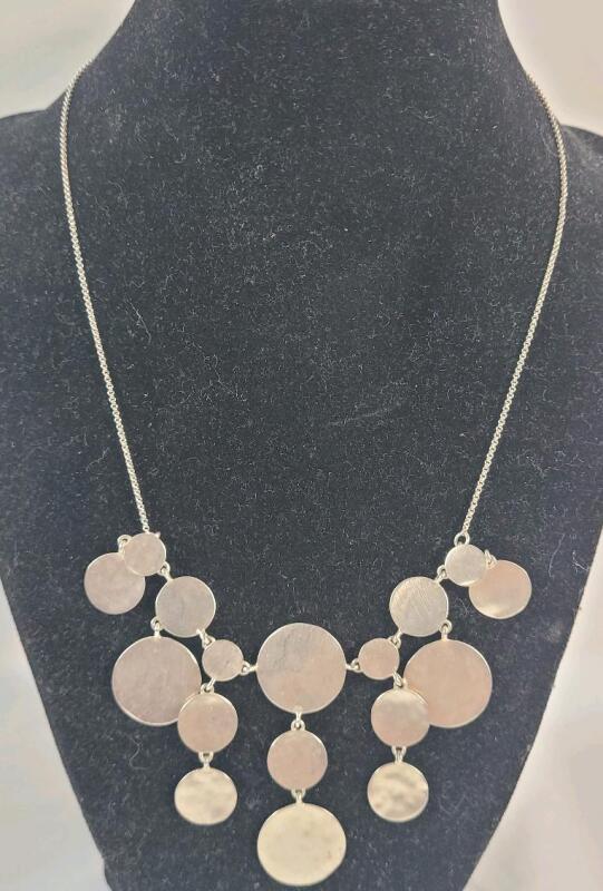 Sterling Silver Cascading Disc Necklace . Chain measures 17.5" long